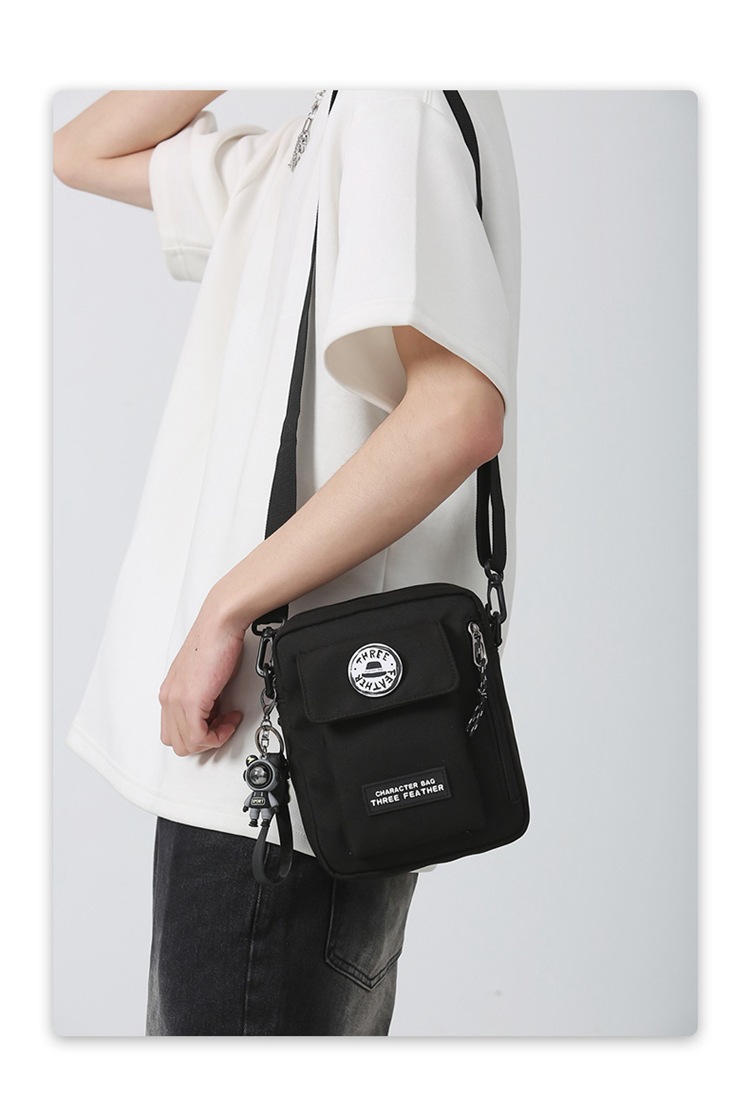 潮酷港風(fēng)休閑男運(yùn)動手機(jī)小包2023新款唐妮兒學(xué)生女機(jī)車單肩斜挎包